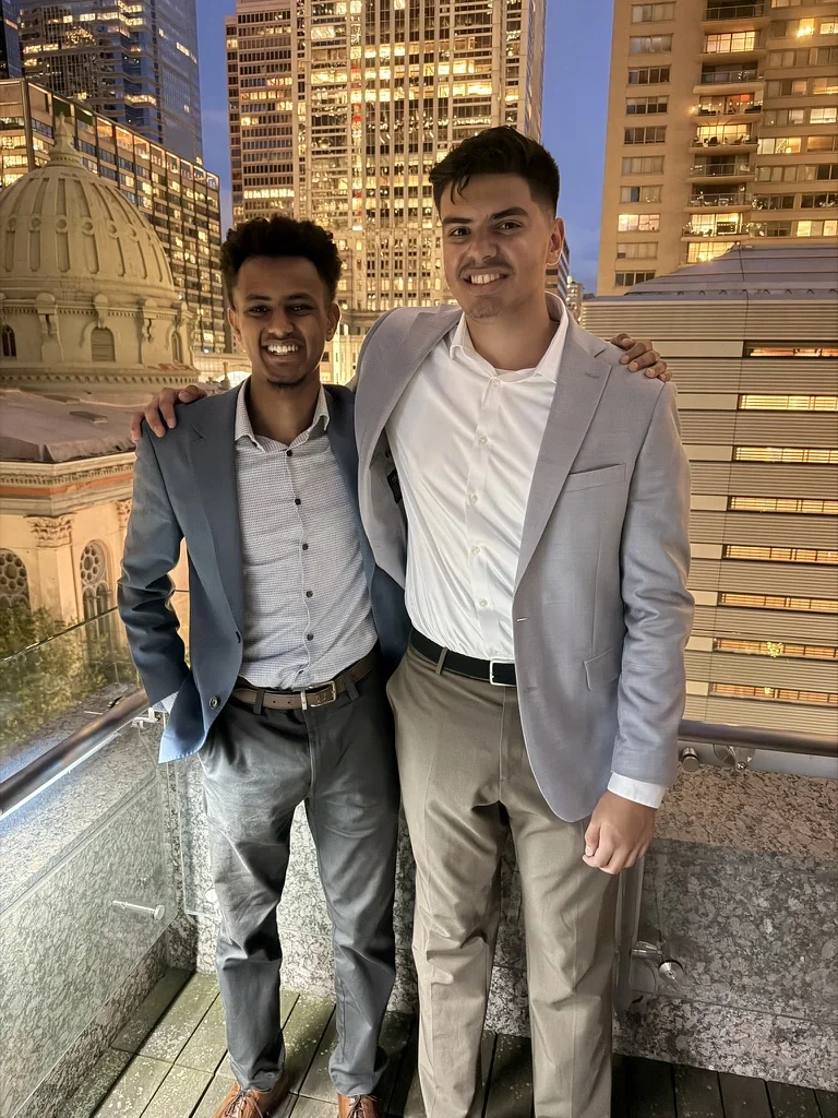Neil Rayarao and Eyob Treiser Brown on a Philadelphia rooftop