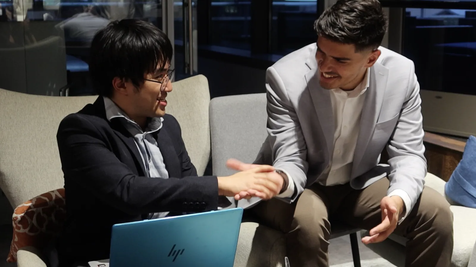 Two members meeting at a oneprompt event